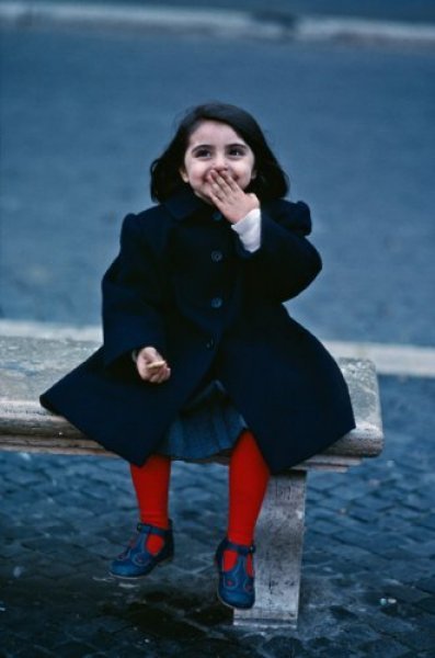 A Little Girl Laughing at St. Pauls Cathedral