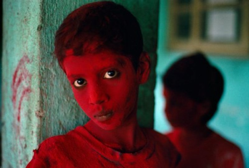 Red Boy During Holi Festival